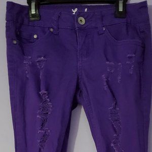 Purple ripped skinny jeans